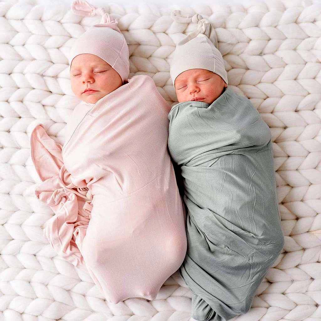 SWADDLES , SLEEP SACKS N MORE